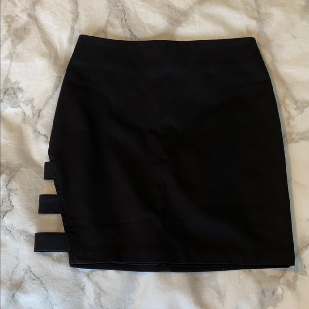 NWOT by the way. Black Side Cut Out Mini Skirt